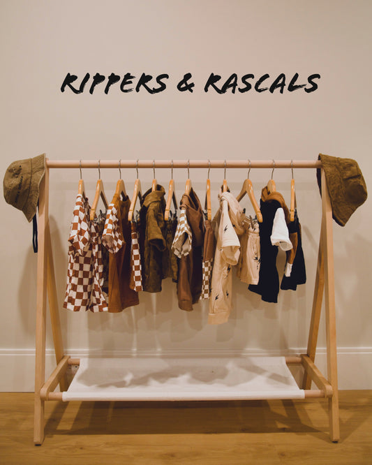 Neutral-colored baby and toddler boy outfits by Rippers & Rascals, featuring timeless and versatile designs perfect for any occasion.